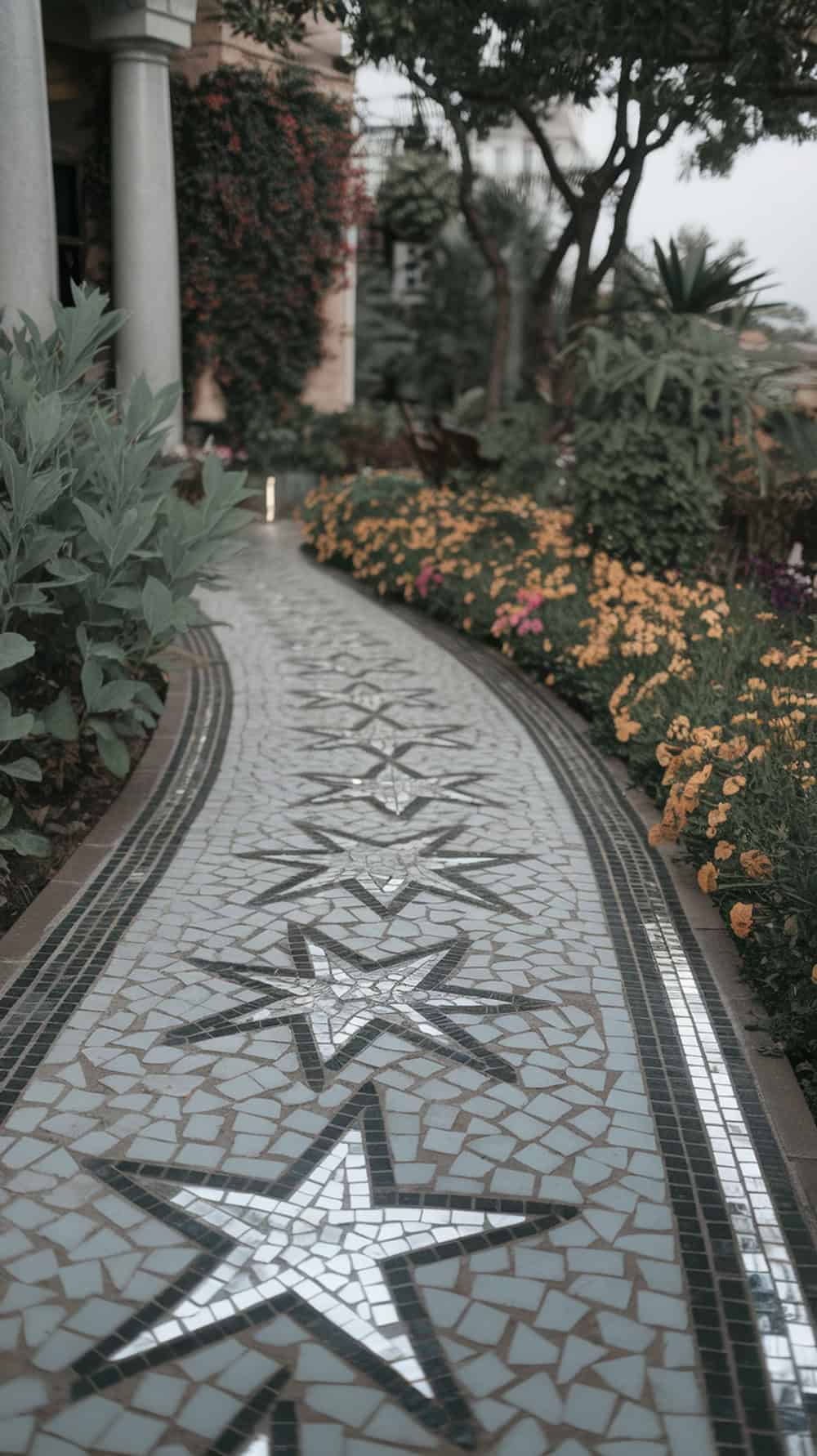 A winding pathway made of star-shaped stones with mirror accents, surrounded by colorful flowers.