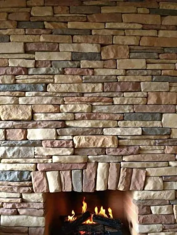 warm ledgestone fireplace wall