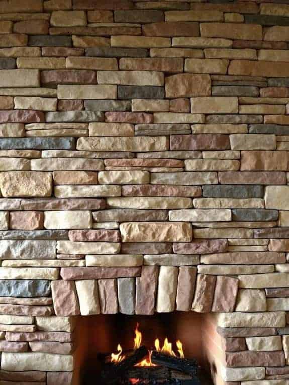 warm ledgestone fireplace wall