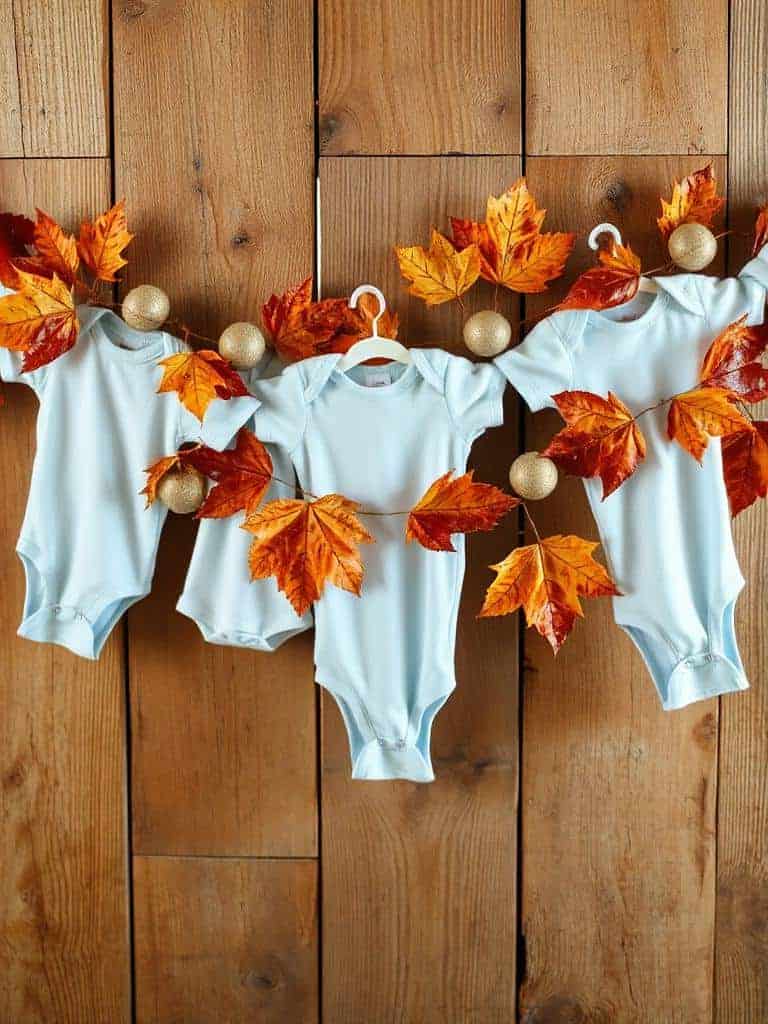 baby blue onesie garland
